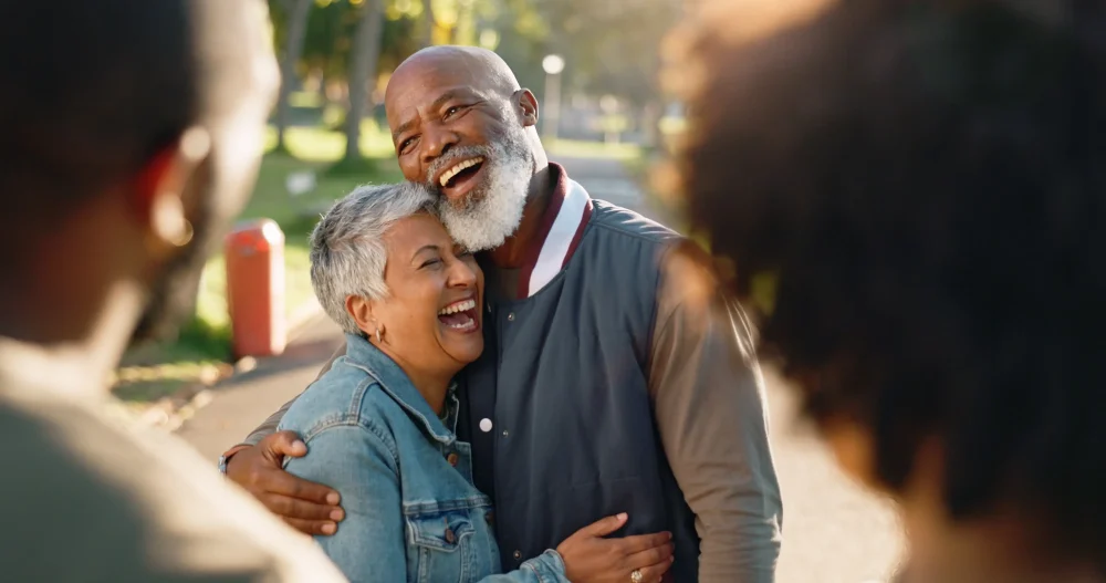 hug love and senior couple in park bonding together