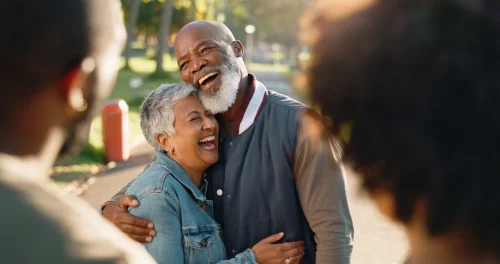 hug love and senior couple in park bonding together